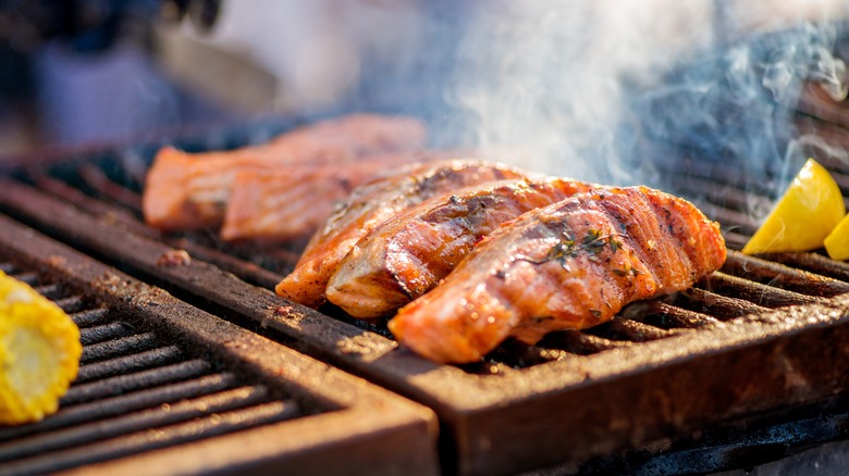 fish cooking on grill