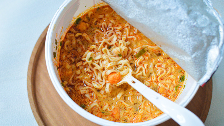 bowl of instant ramen with fork