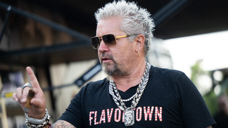 Guy Fieri in a Flavortown shirt