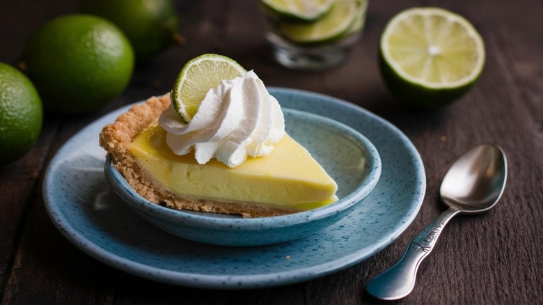 A slice of key lime pie on a plate