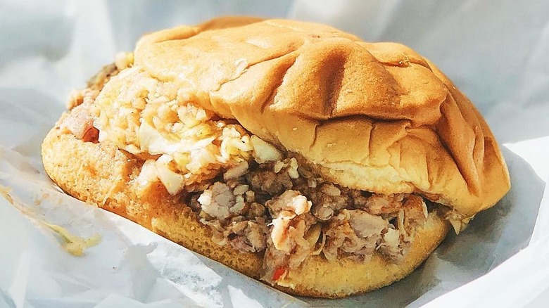 A pulled pork sandwich with slaw from Lexington Barbecue