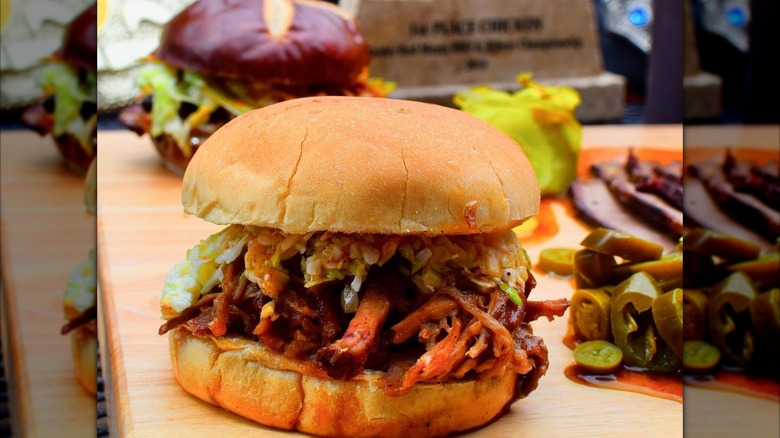 A pulled pork sandwich with coleslaw from Slap's BBQ