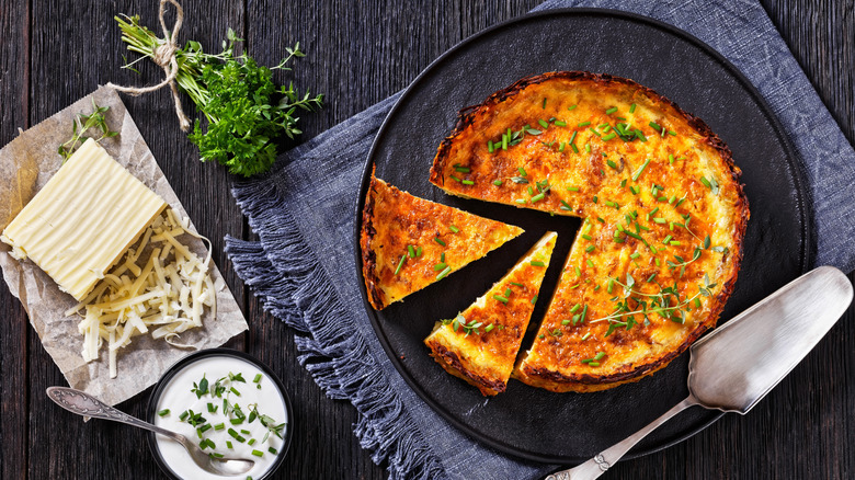 Bacon and cheddar quiche with potato crust