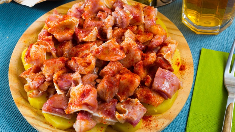 bowl of seasoned and cooked pig ears