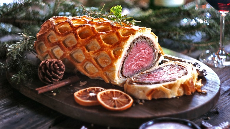 Beef Wellington on wood board