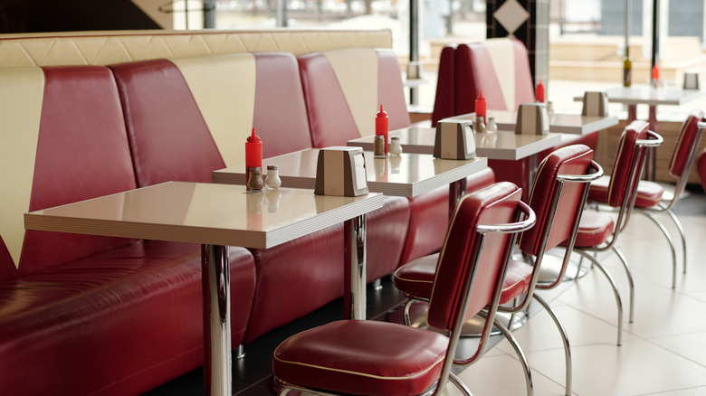 Empty diner tables and chairs