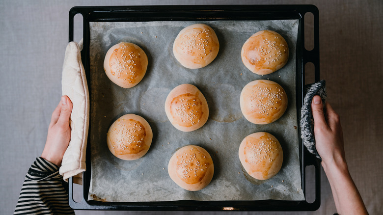 dinner rolls on a baking sheet