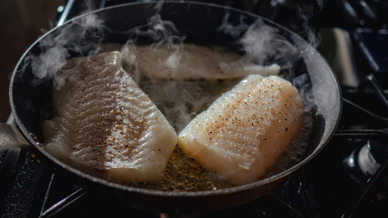 Cod in a skillet with butter