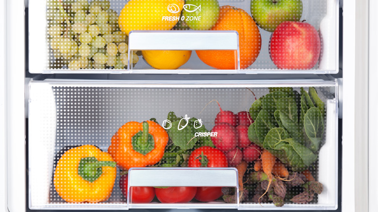 Refrigerator drawers filled with fruits and vegetables