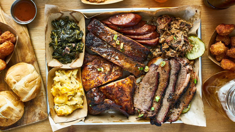 Tray of different barbecue meats and sides