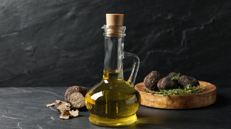 Bottle of truffle oil with truffles