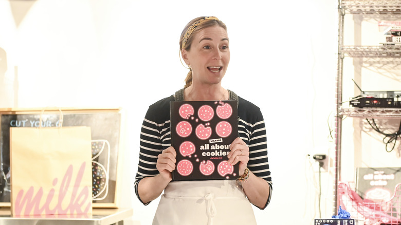 Christina Tosi Holding "All About Cookies" Book