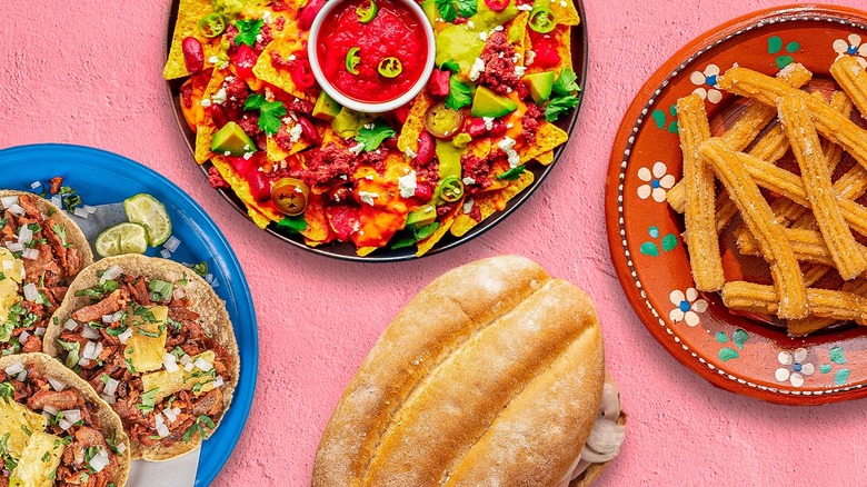 Mexican dishes on pink background