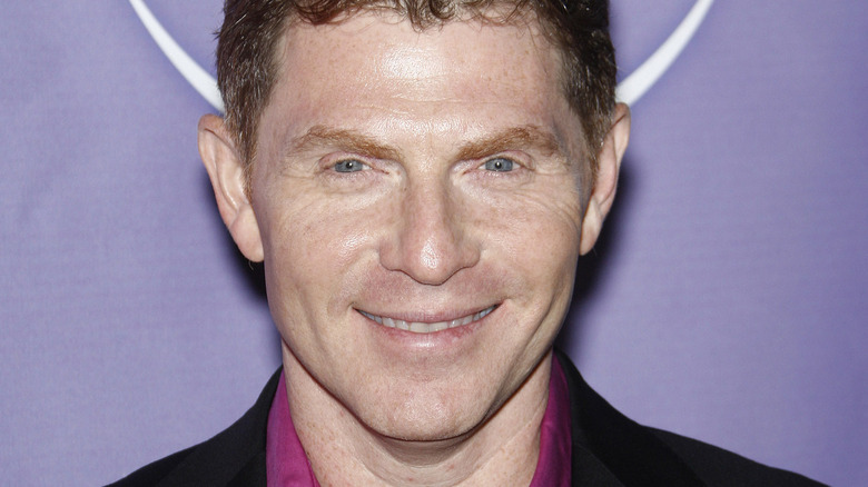 Bobby Flay smiles in close up pic