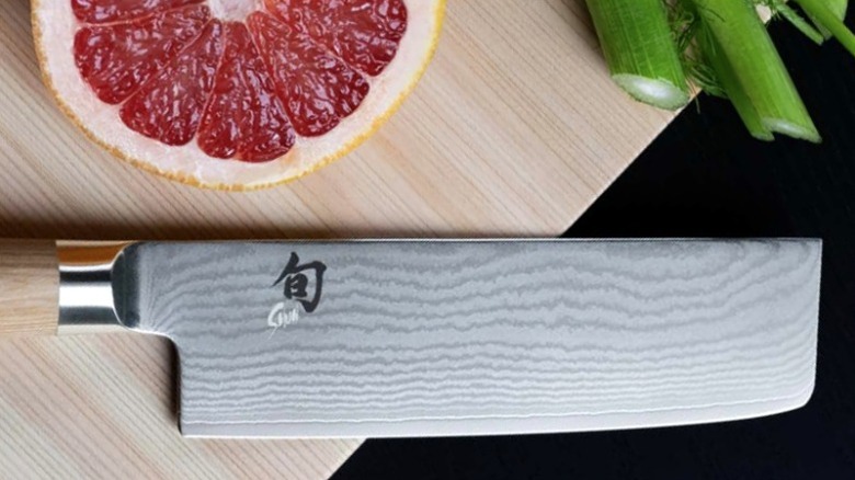 Shun knife on cutting board