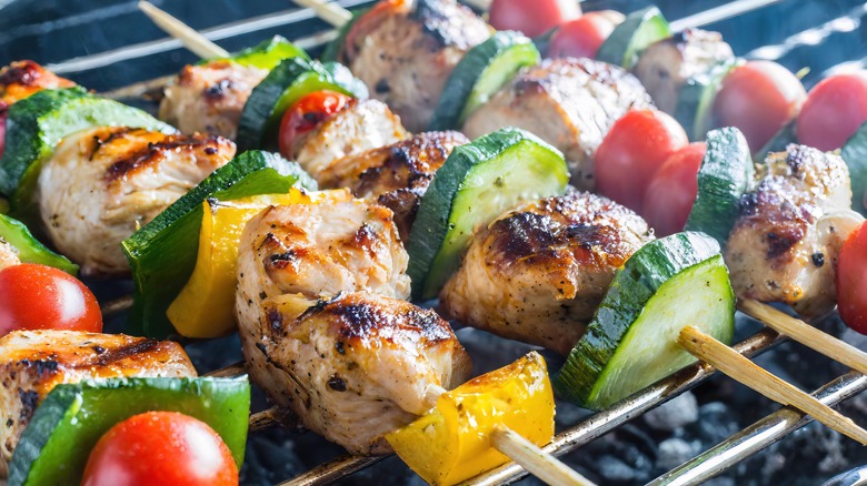 Chicken kebabs on a grill