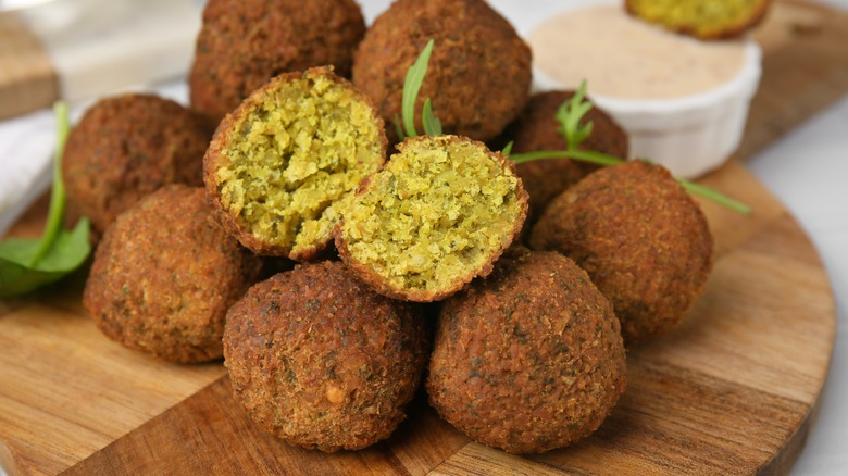 Crispy falafel balls on a cutting board