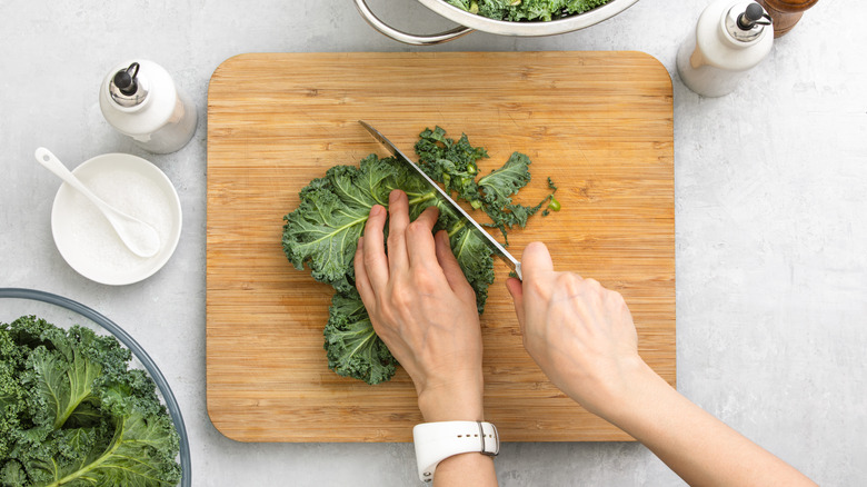 Woman cutting kale