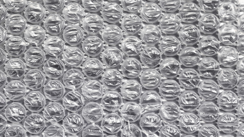 bubble wrap on a black surface