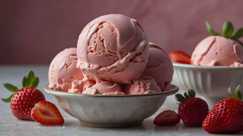 bowl with scoops of strawberry ice cream