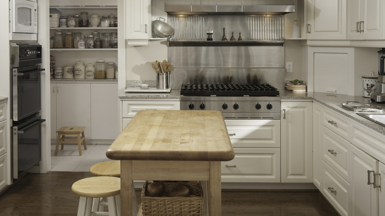 A cook's table in a modern home kitchen