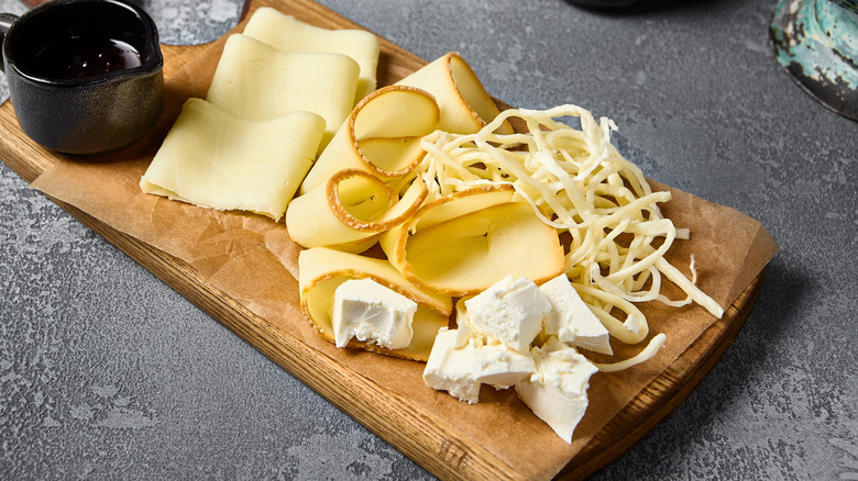 An artfully arranged cheese board.