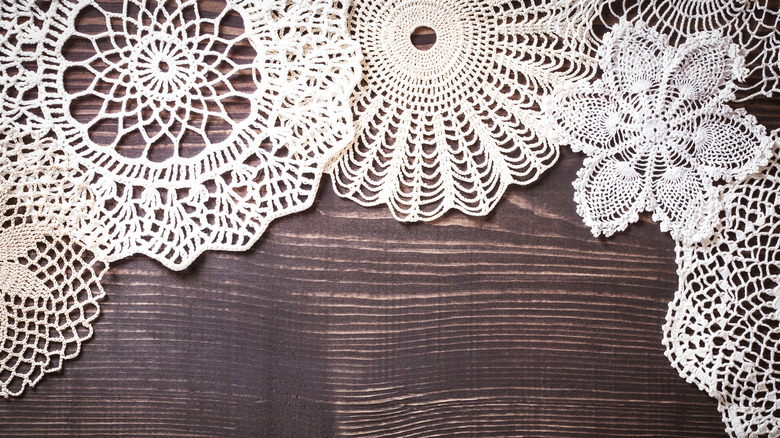 vintage white lace on a wooden table