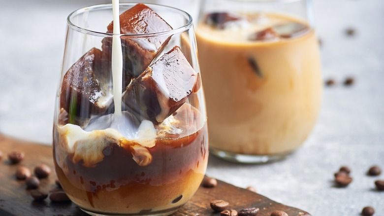 Coffee ice cubes in glass 