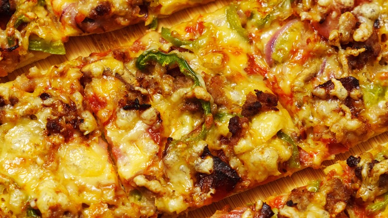 A close up of square-cut pizza