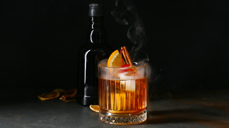 Old fashioned cocktail with rye whiskey in background