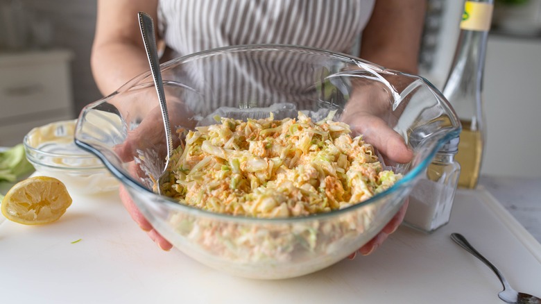 Freshly tossed bowl of coleslaw.