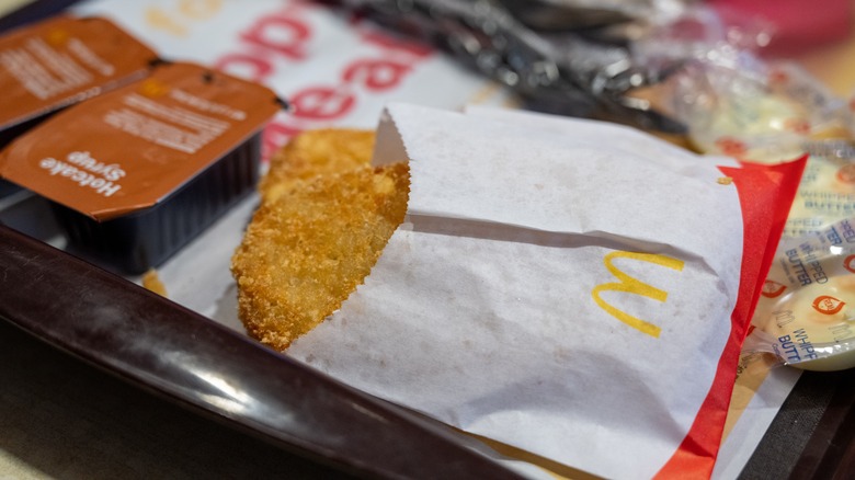 McDonald's hashbrown on a tray