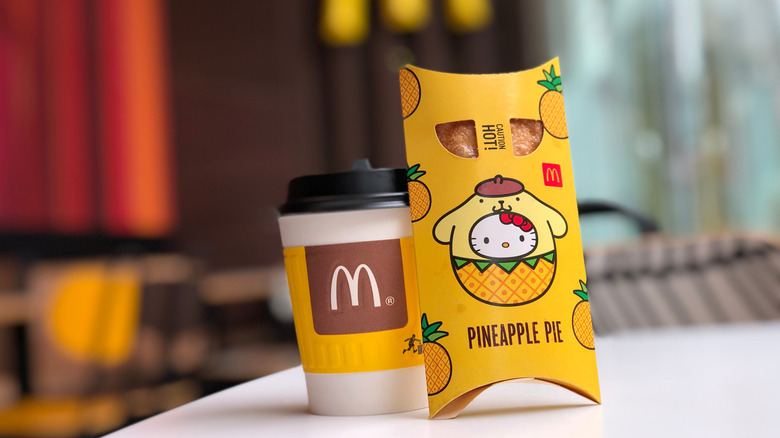 mcdonald's hello kitty pineapple pie and cup of coffee