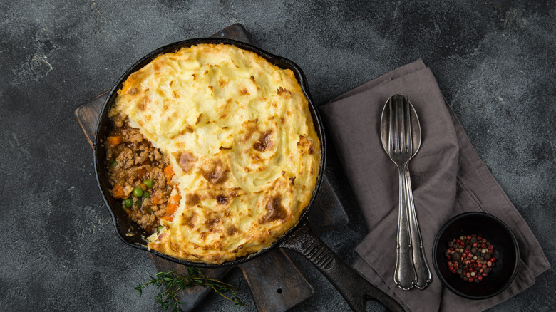 Shepherd's pie with silverware and napkins