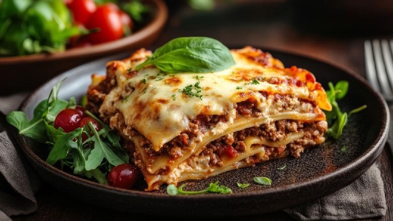 lasagna portion with basil leaf