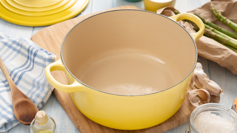 A sunny yellow enameled cast iron pot