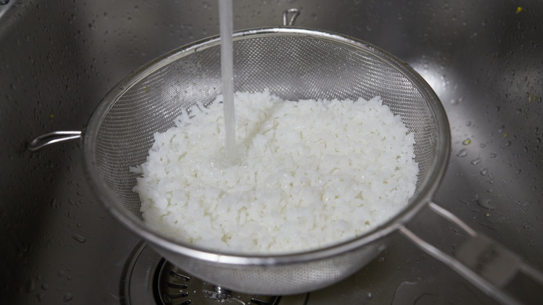 White rice in colander