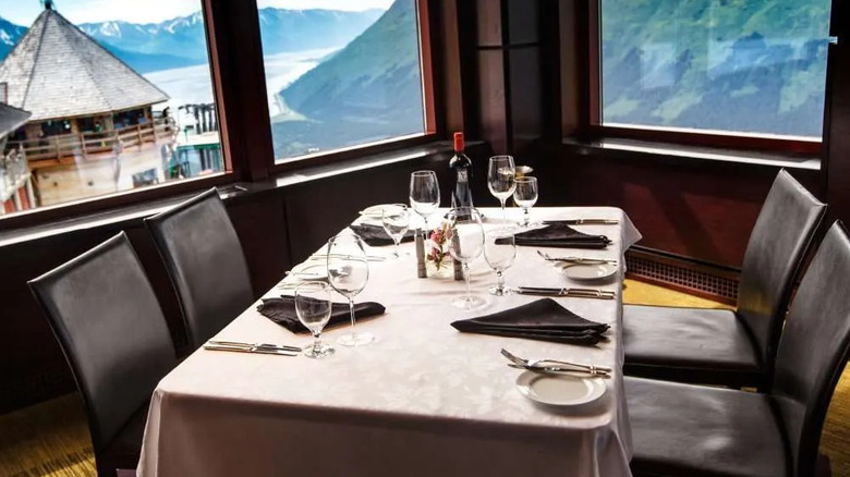 A table at Seven Glaciers restaurant with scenic views