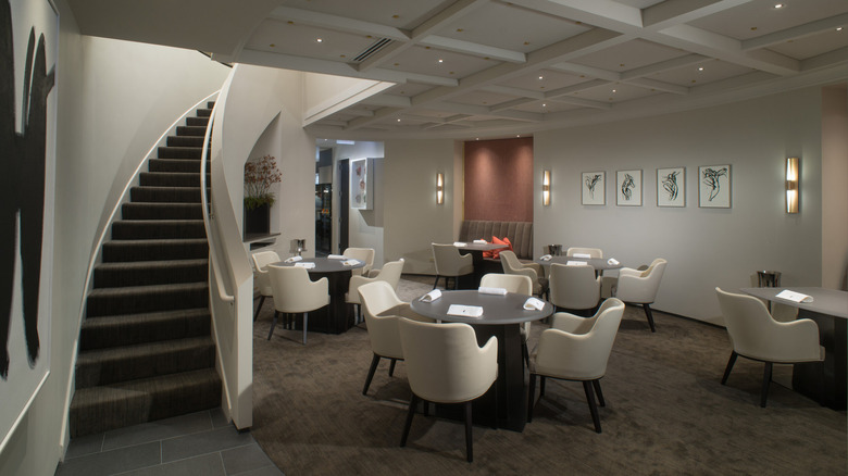 A stylish, white-scape dining room