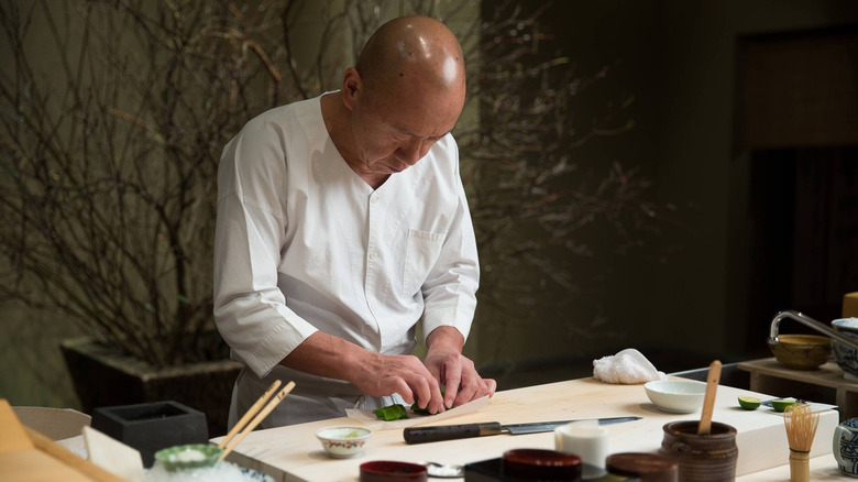 A chef making sushi