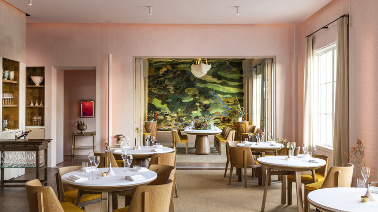 A pink-hued dining room