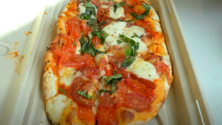 Primo Piatto margherita pizza on cardboard