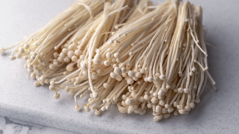 Bunches of enoki mushrooms