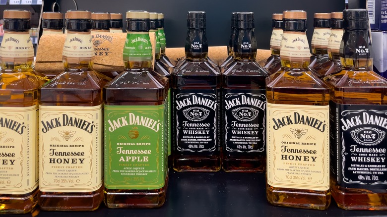 shelf of Jack Daniels bottles