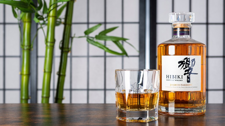 Hibiki Suntory whiskey bottle and glass