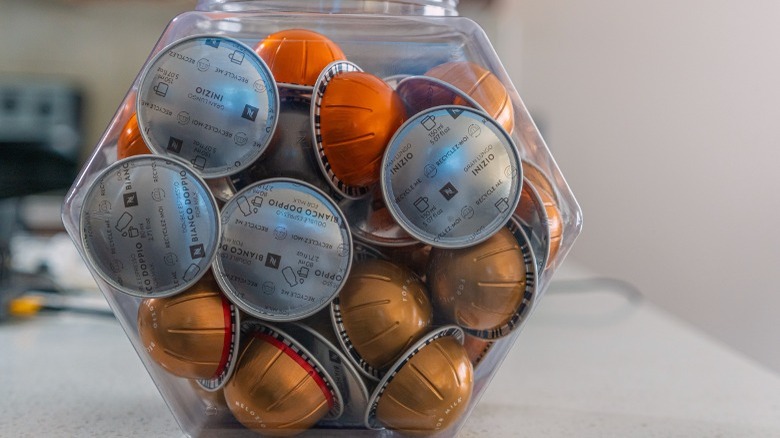 Nespresso coffee pods in a hexagonal canister