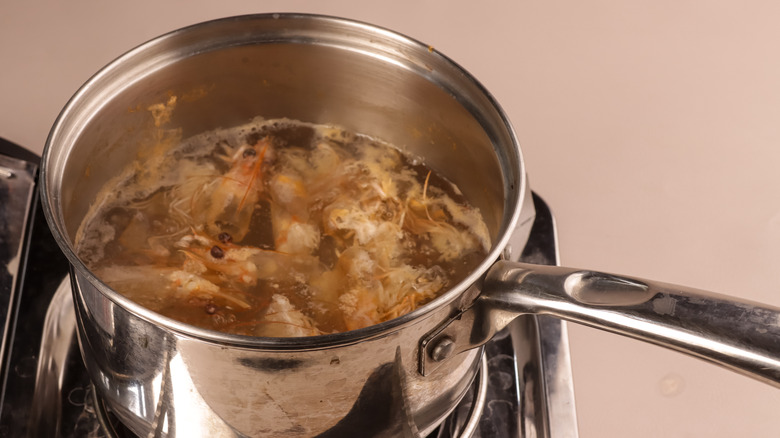 Shrimp stock cooking in pot