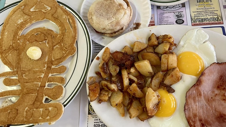 Lobster pancake, hashbrowns, and fried eggs at Mustache Bill's Diner