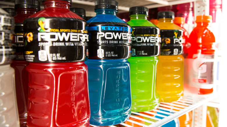 Powerade bottles lined up in fridge