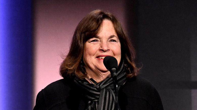 Ina Garten standing in front of a microphone
